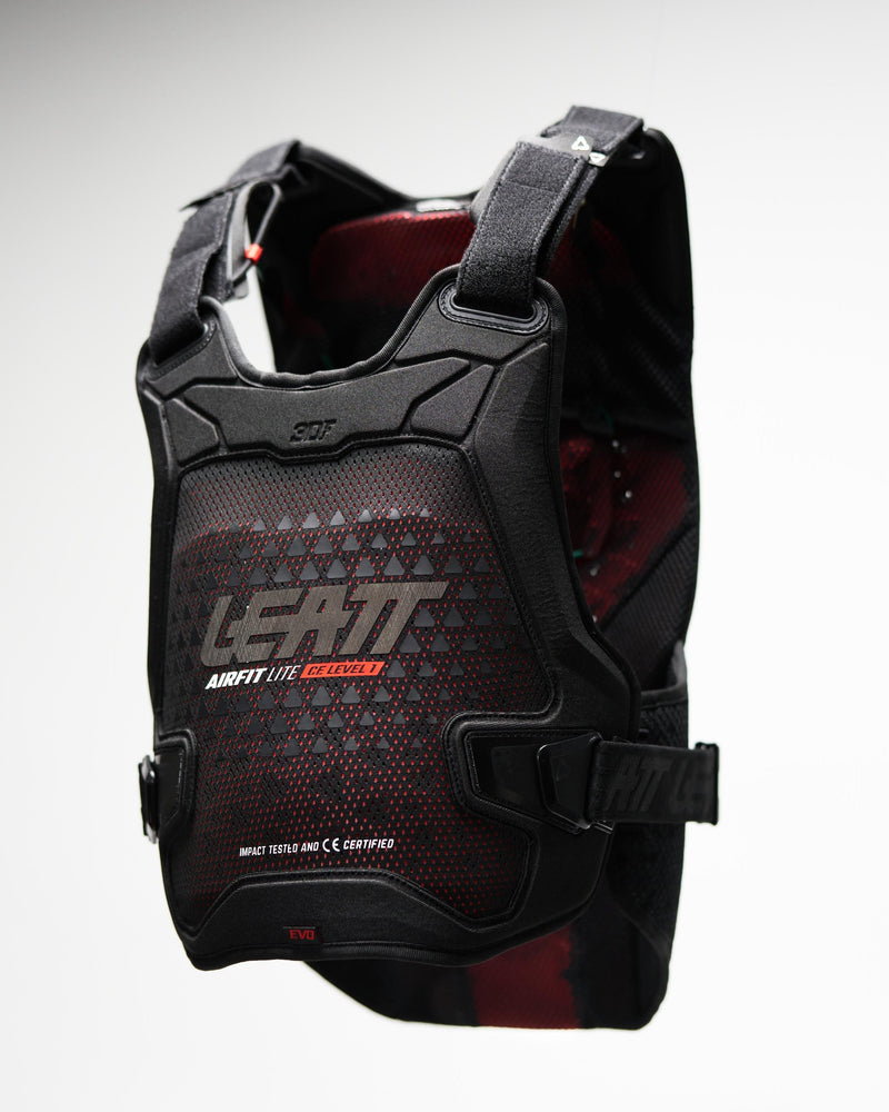 Black protective vest with brand logo on a gray background