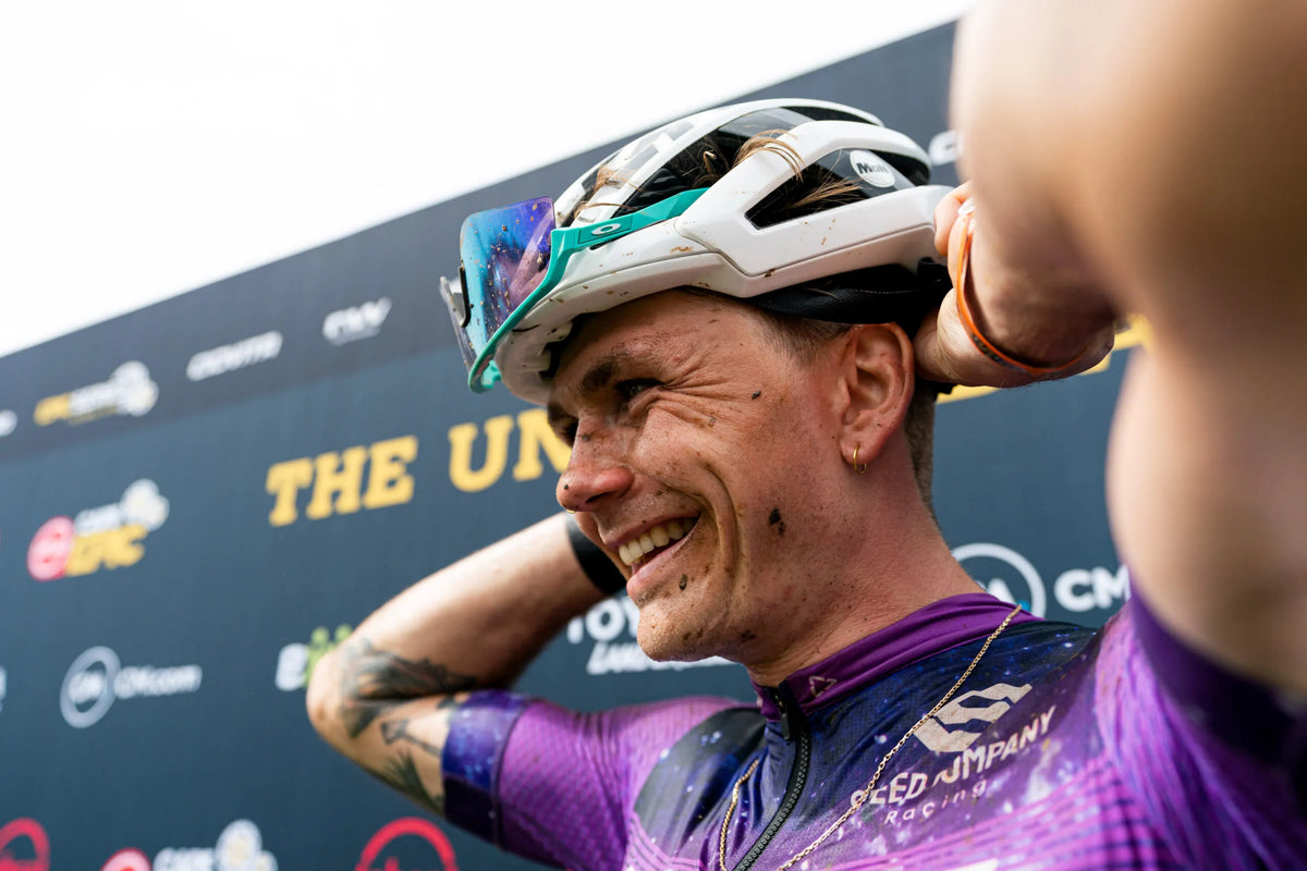 Georg Egger smiling on the podium