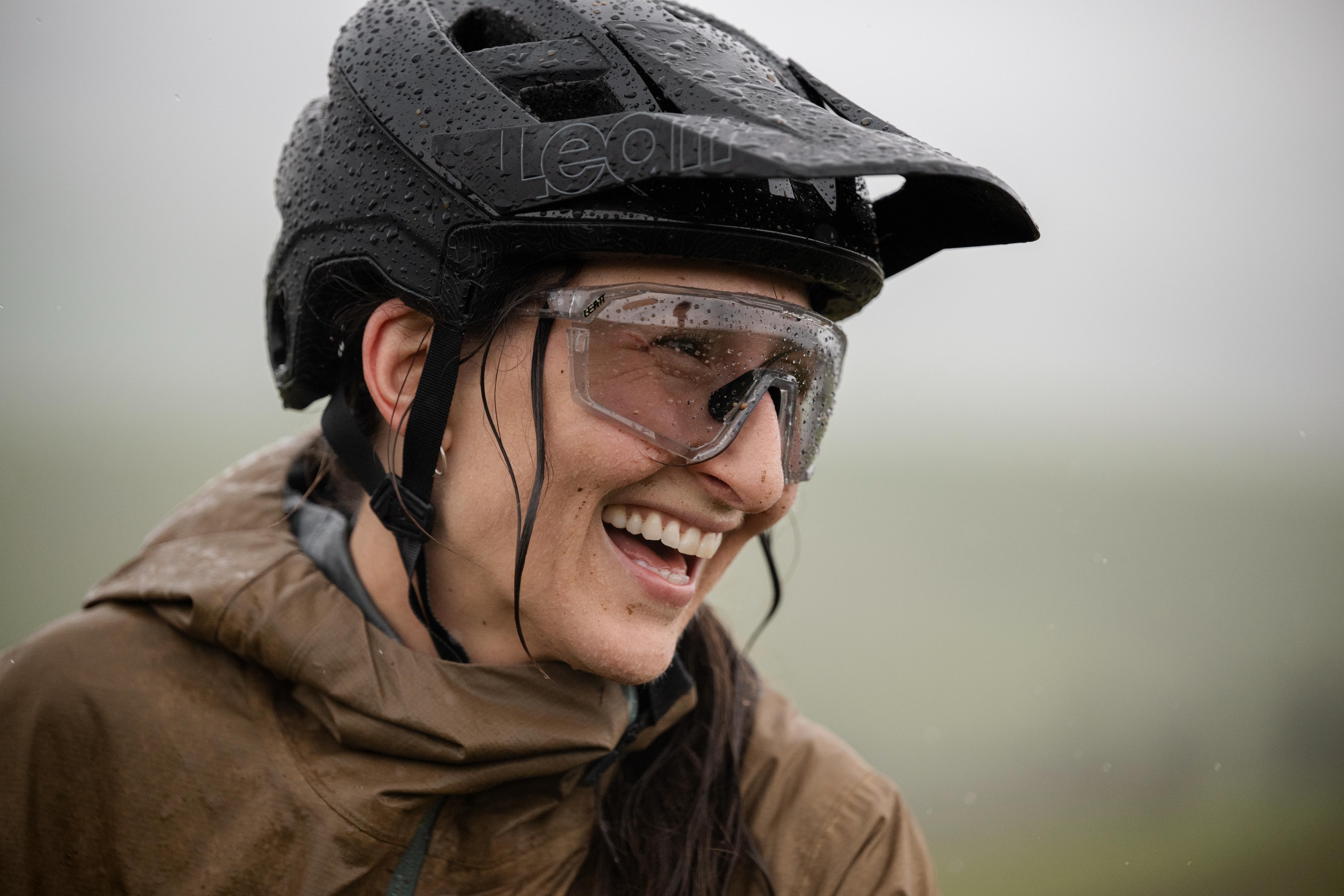 Person wearing a helmet and goggles with a blurred background